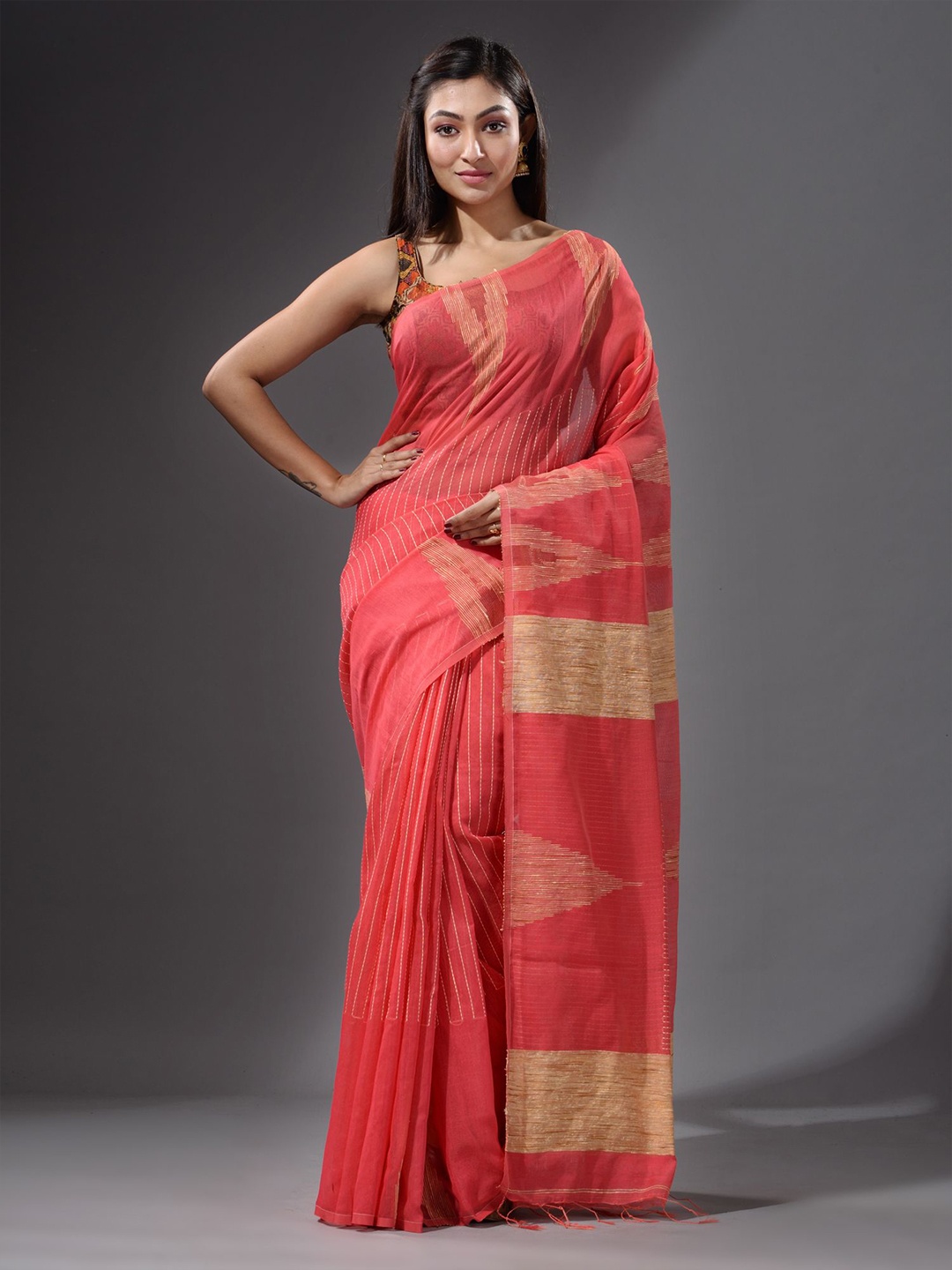 

Charukriti Pink & Beige Ethnic Motifs Saree