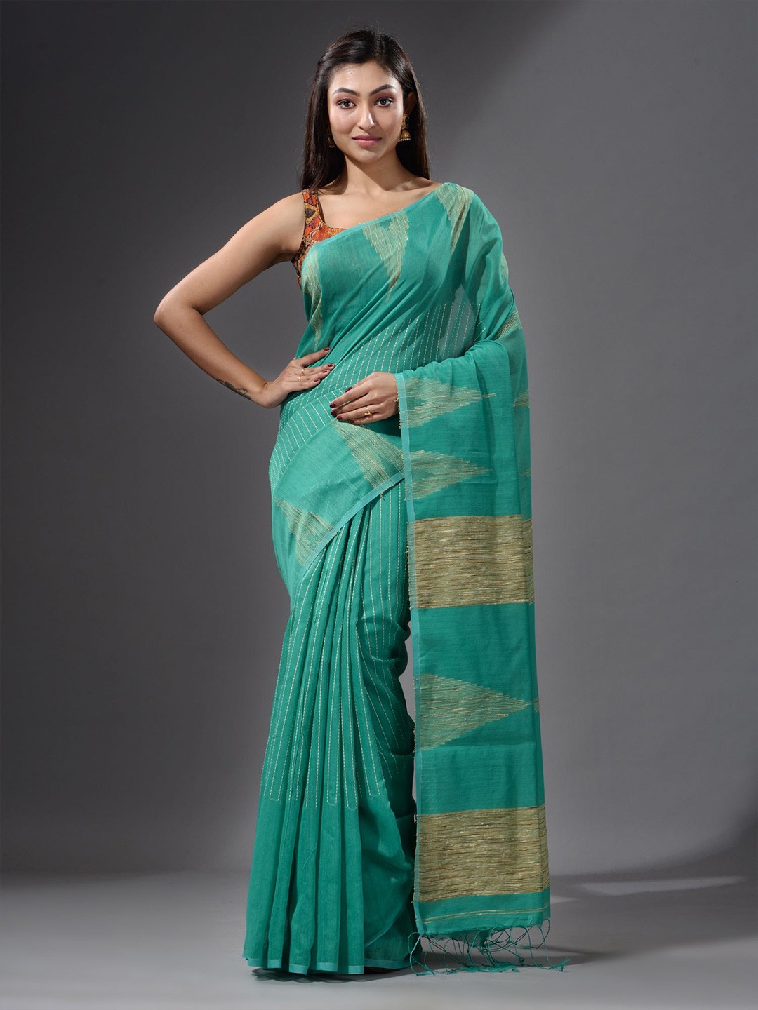 

Charukriti Green & Beige Woven Design Saree