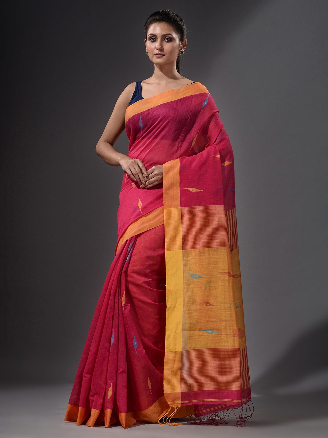 

Charukriti Magenta & Yellow Woven Design Saree