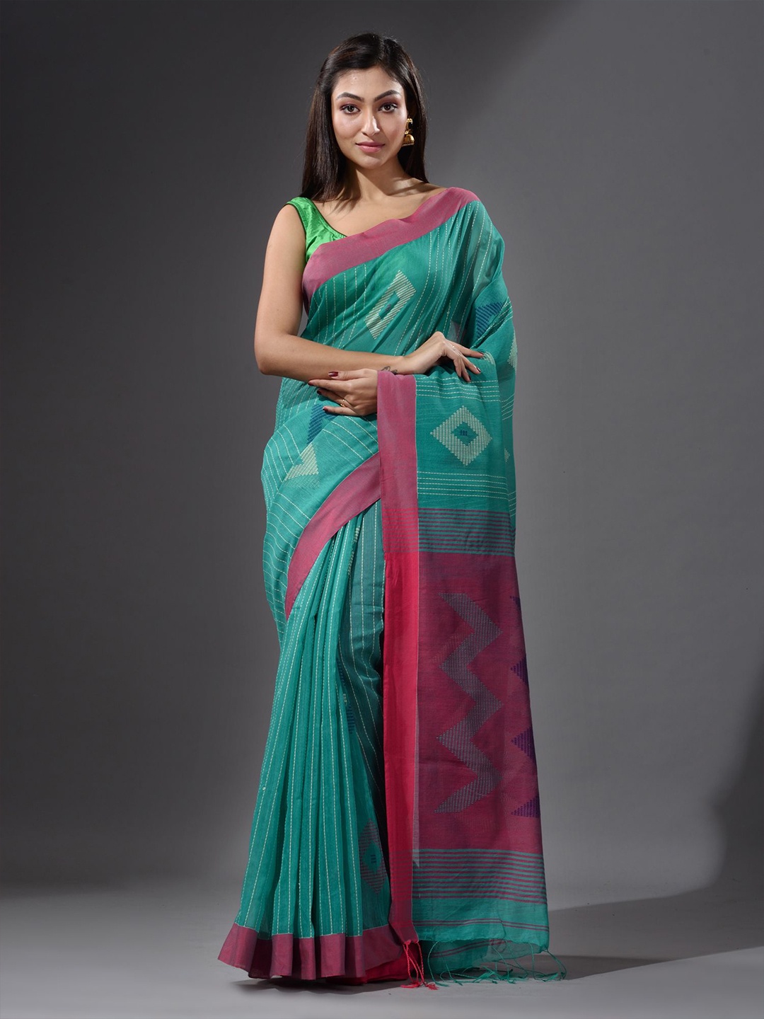 

Charukriti Green & Pink Geometric Woven Design Saree