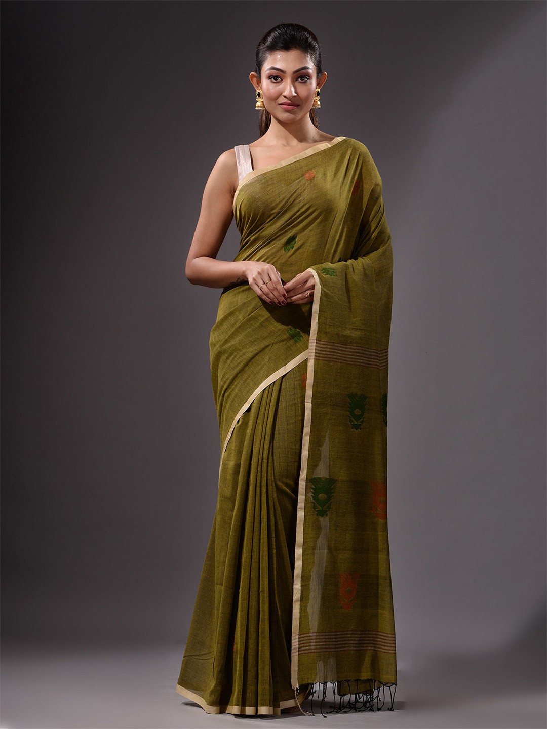 

Charukriti Green Woven Design Pure Cotton Saree