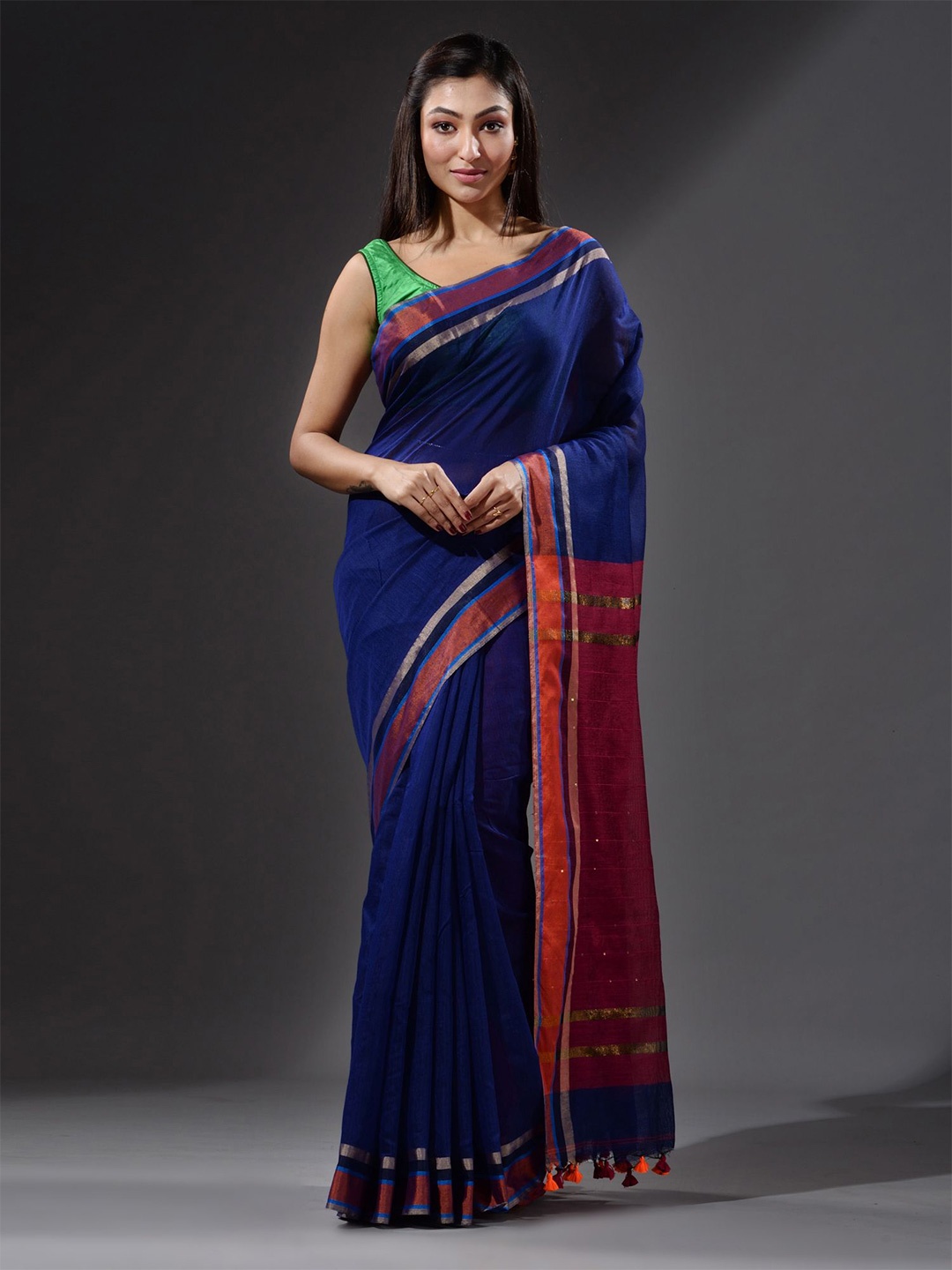 

Charukriti Blue & Maroon Solid Zari Saree