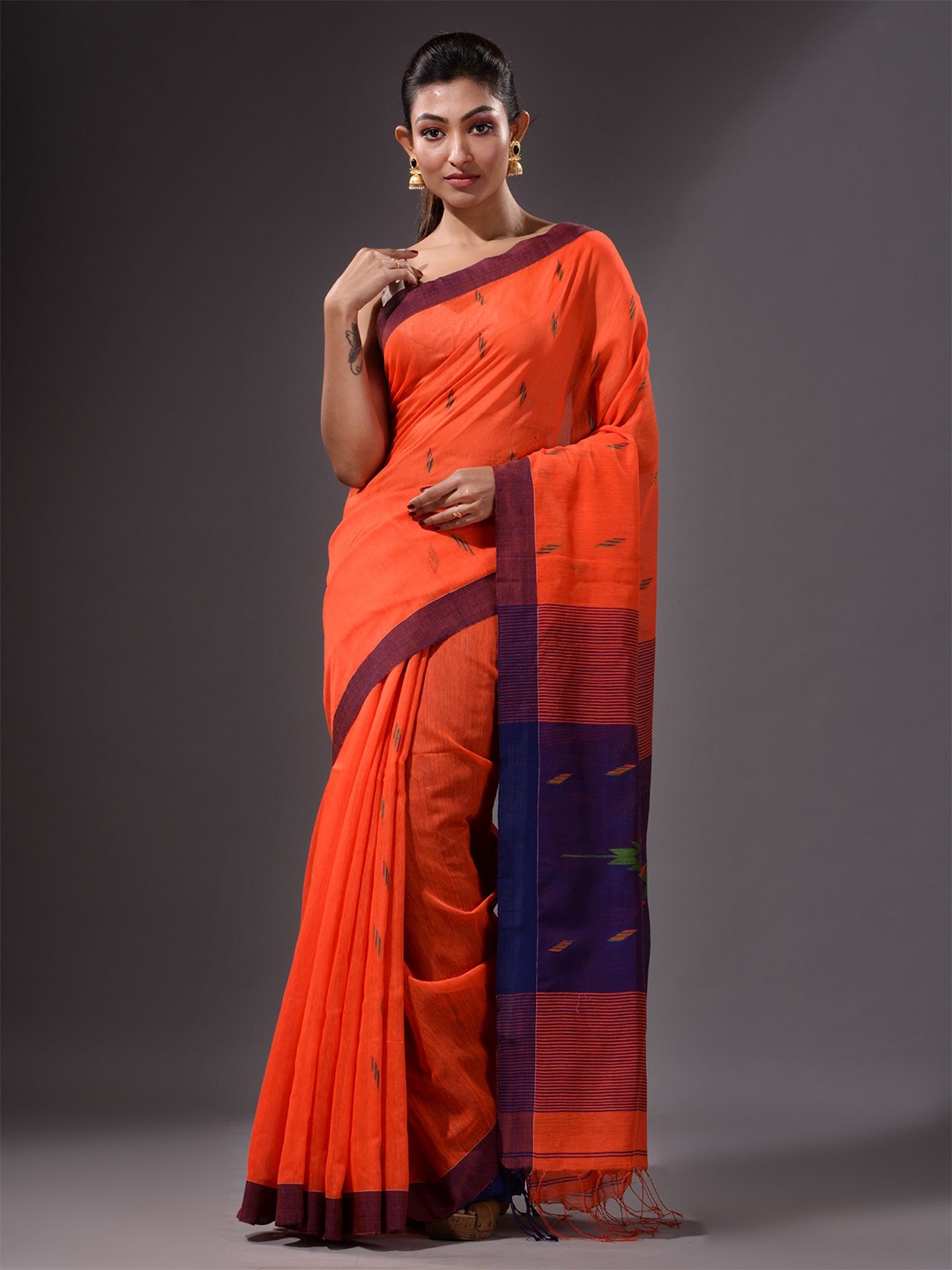 

Charukriti Orange & Blue Woven Design Saree
