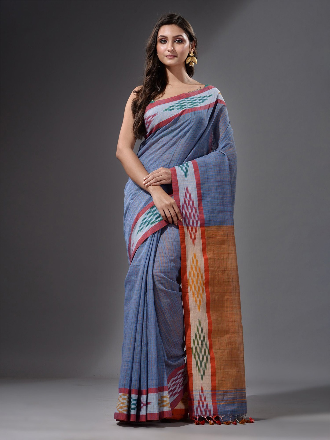 

Charukriti Blue & Red Woven Design Saree