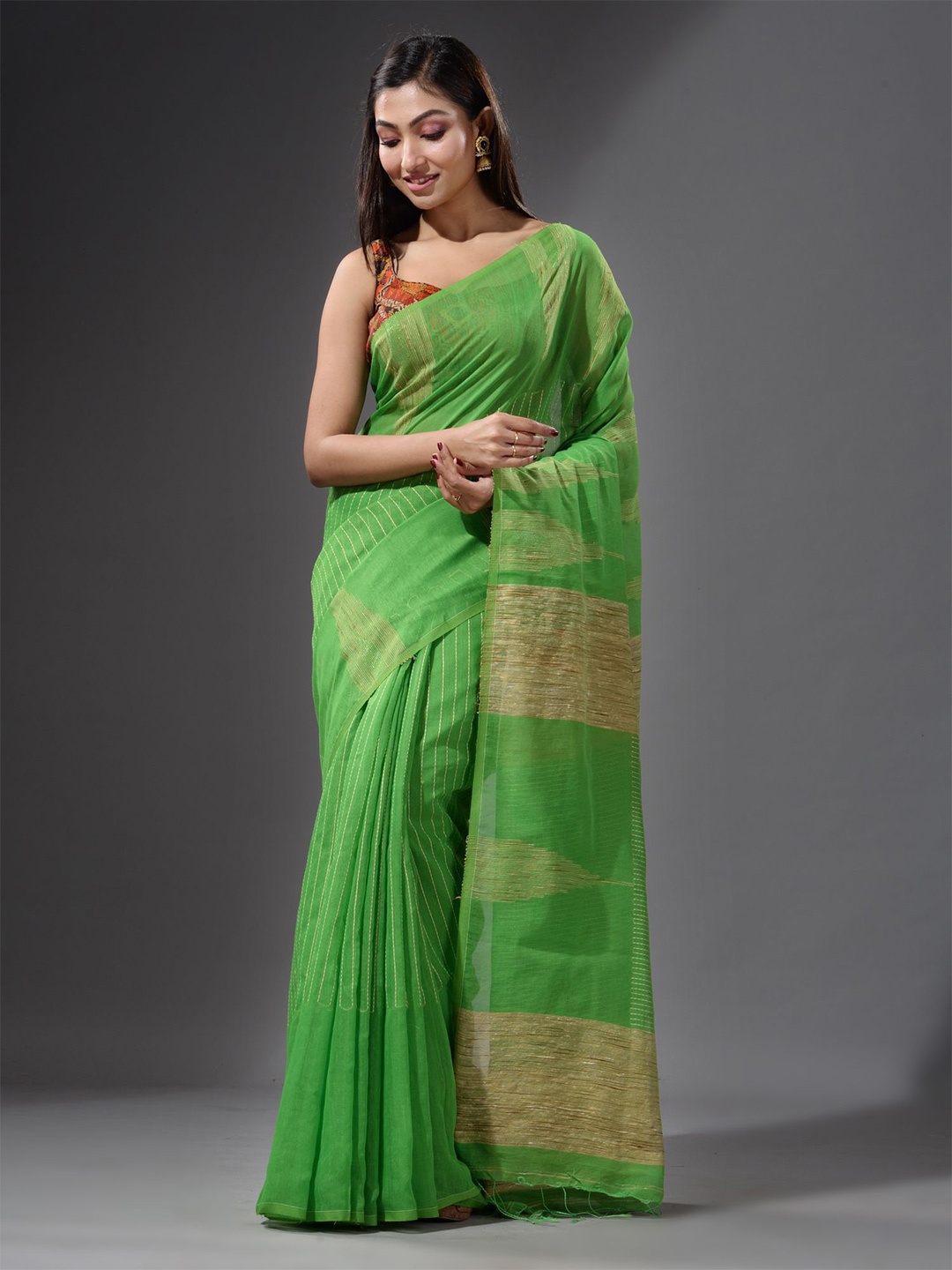 

Charukriti Green & Beige Woven Design Saree