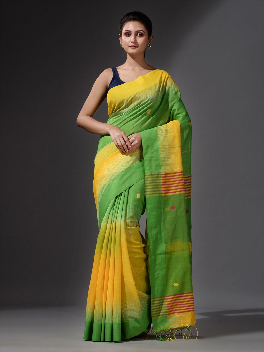 

Charukriti Yellow & Fluorescent Green Woven Design Saree