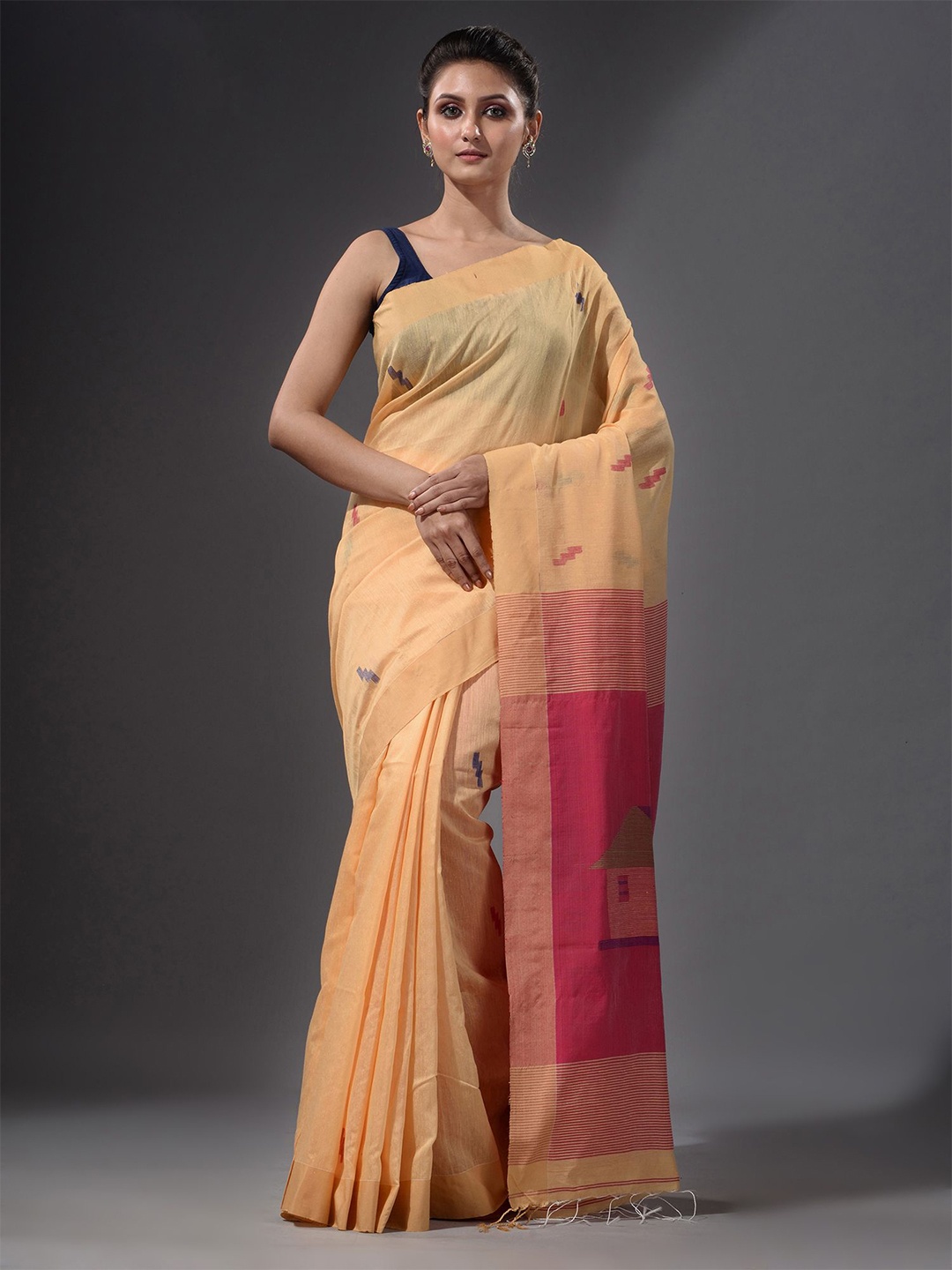 

Charukriti Yellow & Pink Ethnic Motifs Saree