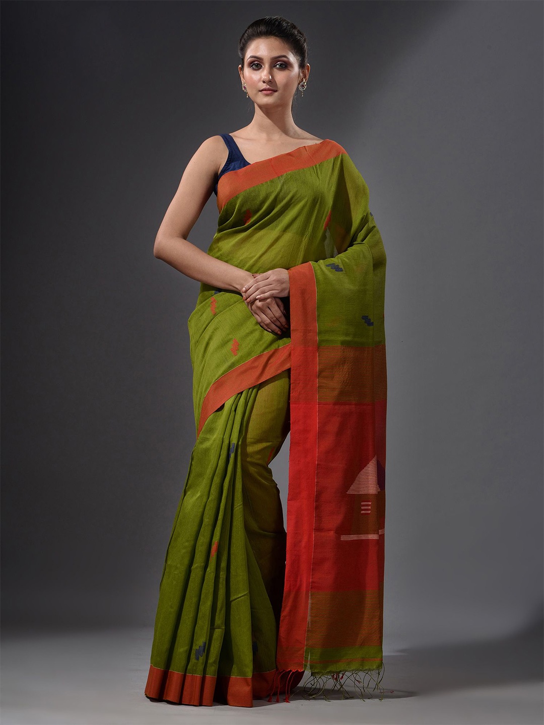 

Charukriti Green & Orange Saree