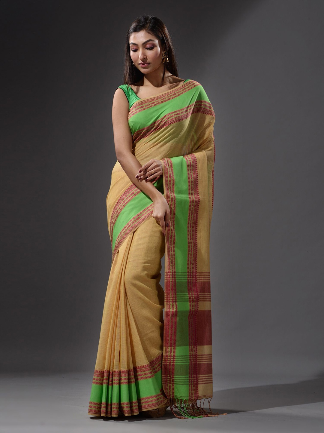 

Charukriti Cream-Coloured & Fluorescent Green Solid Pure Cotton Saree