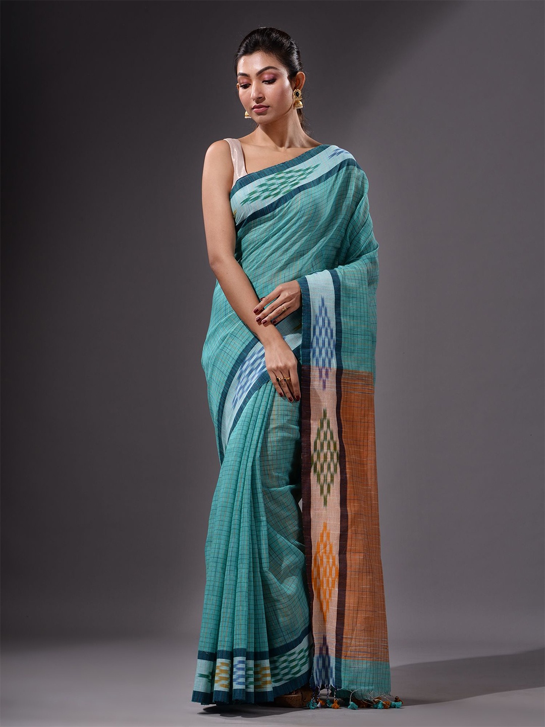 

Charukriti Green & Orange Woven Design Handloom Saree