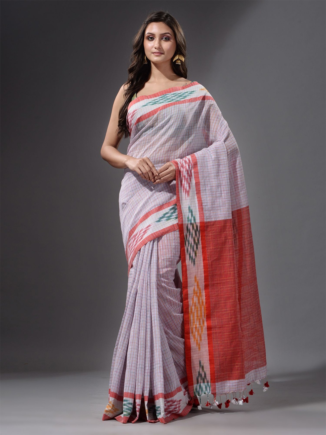 

Charukriti Mauve & Orange Checked Saree