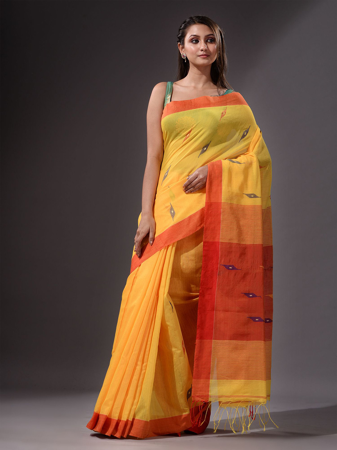 

Charukriti Yellow & Red Woven Design Saree