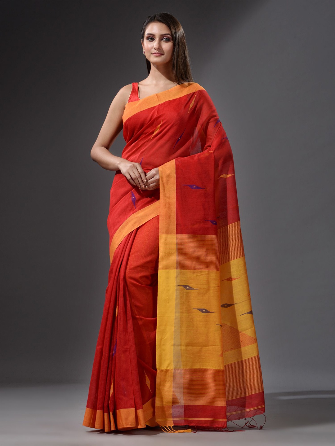 

Charukriti Red & Mustard Woven Design Saree