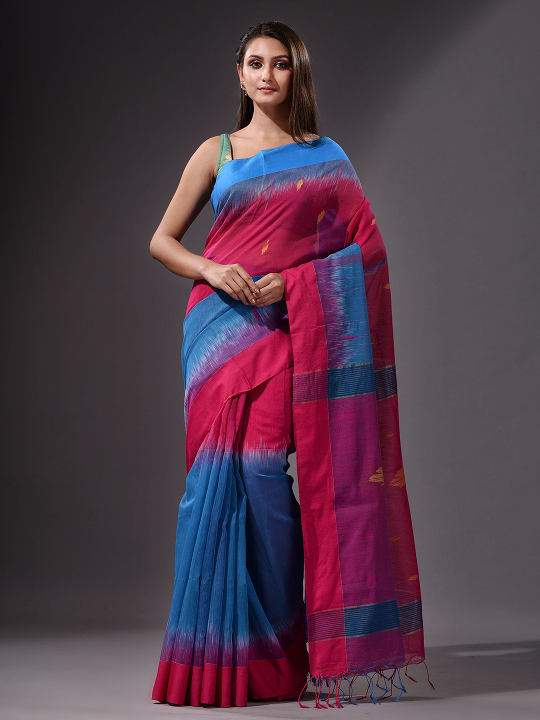 

Charukriti Blue & Fuchsia Woven Design Saree
