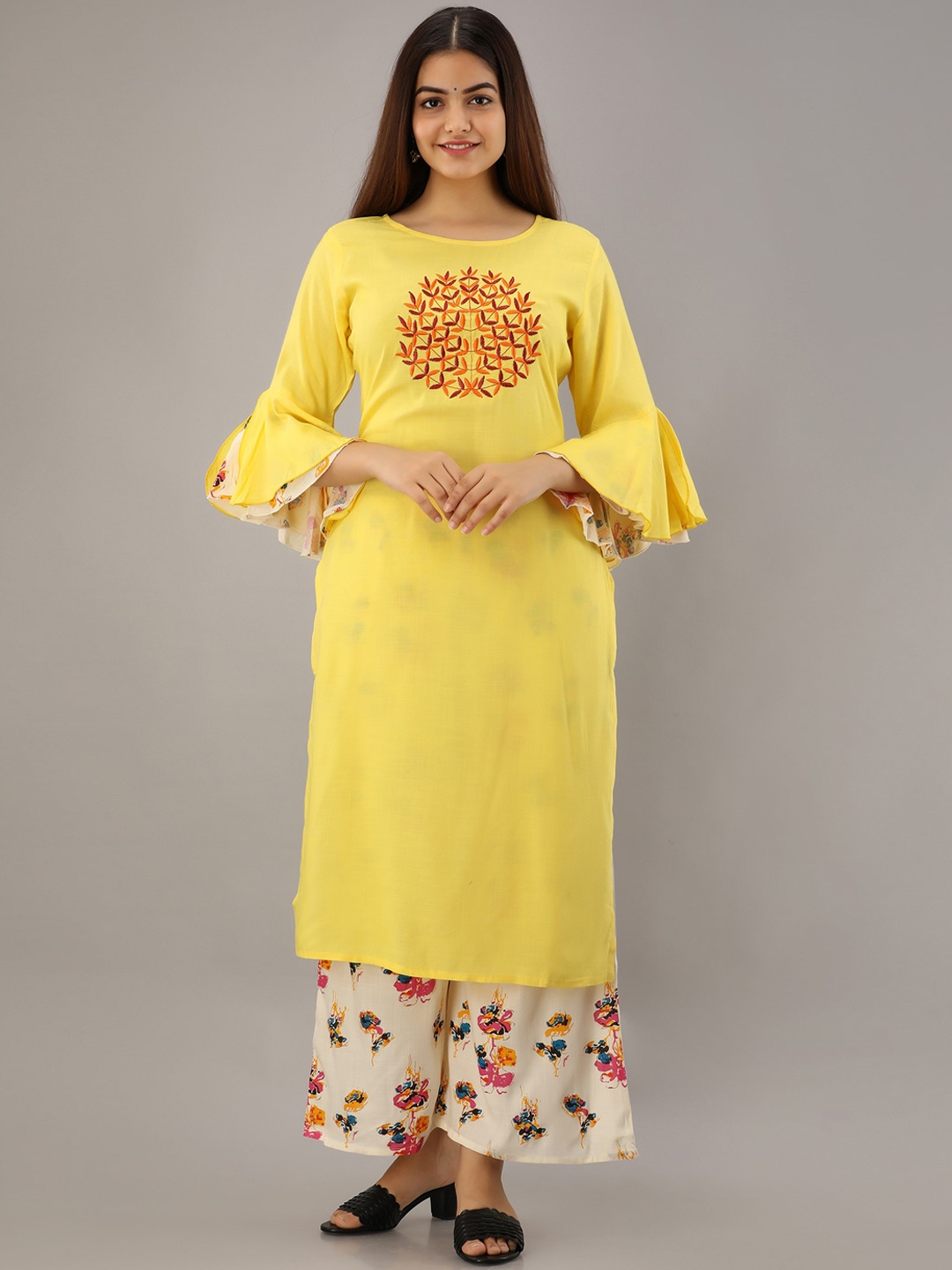 

KALINI Women Yellow Floral Yoke Design Kurta with Palazzos