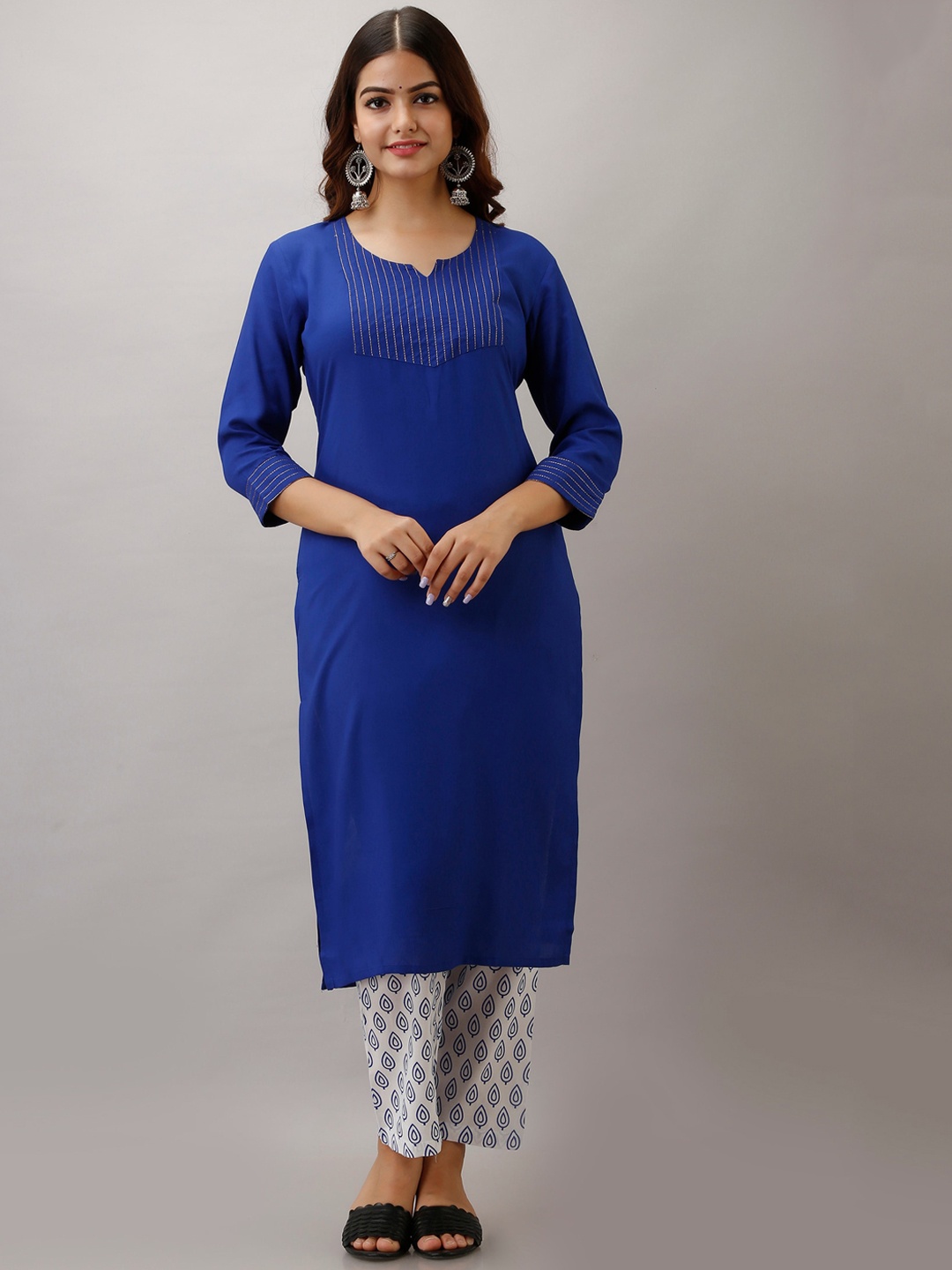 

KALINI Women Blue & White Printed Kurta with Trousers
