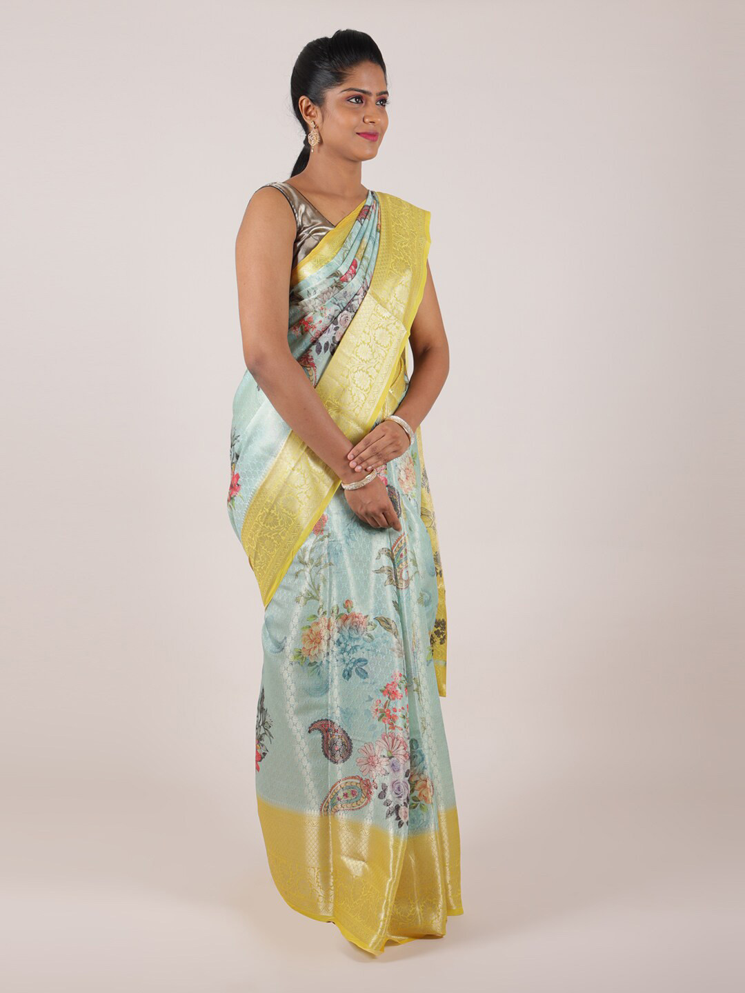 

Pothys Blue & Yellow Floral Zari Art Silk Saree