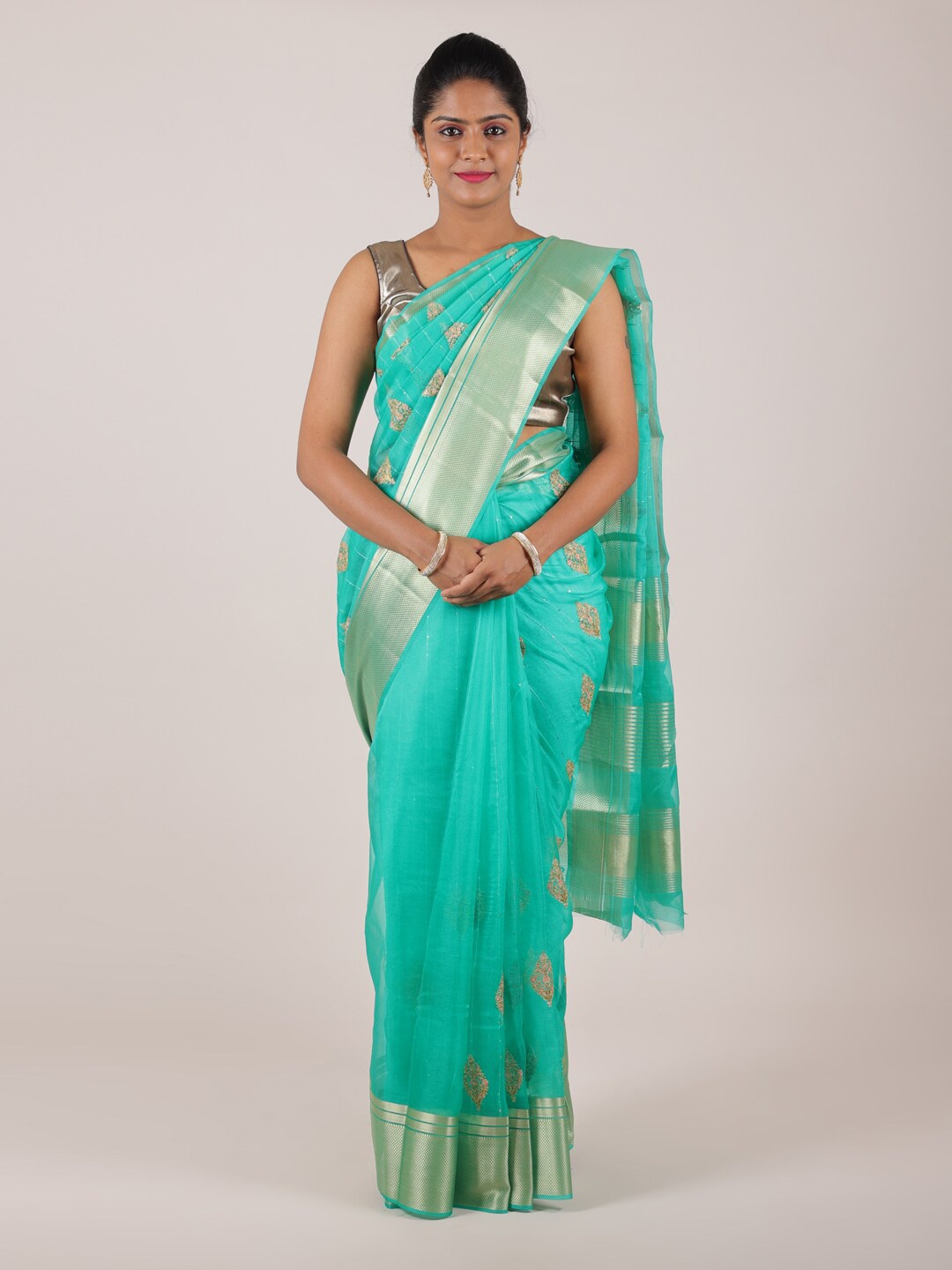 

Pothys Sea Green & Silver-Toned Floral Zari Organza Saree