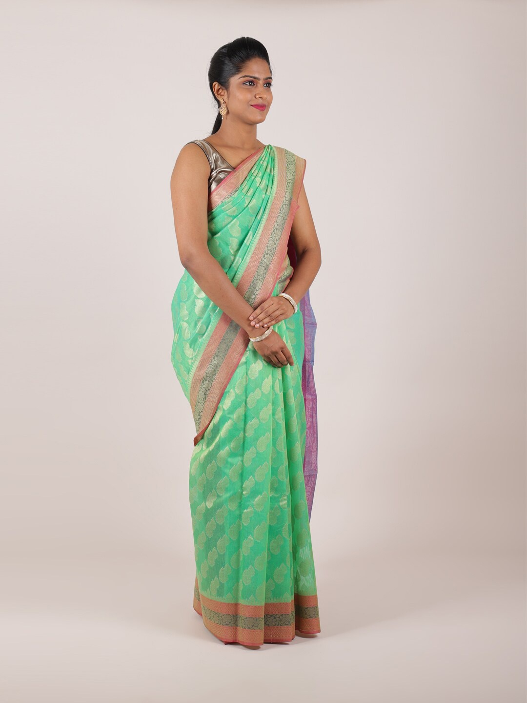 

Pothys Green & Magenta Floral Zari Saree