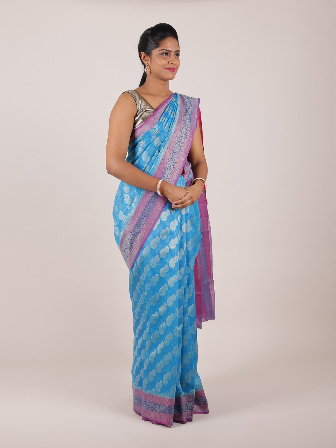 

Pothys Blue & Pink Floral Zari Saree