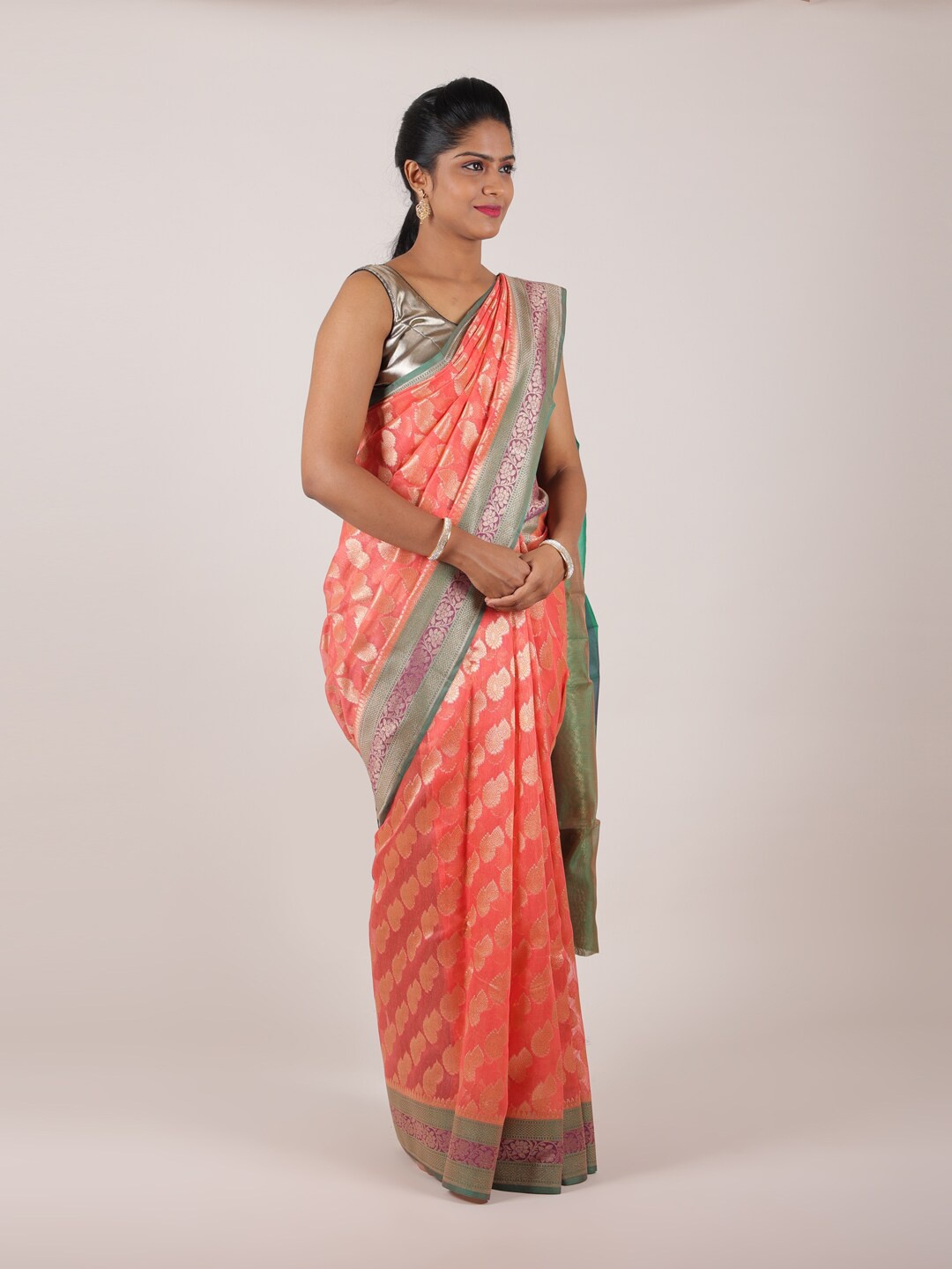

Pothys Pink & Green Ethnic Motifs Saree