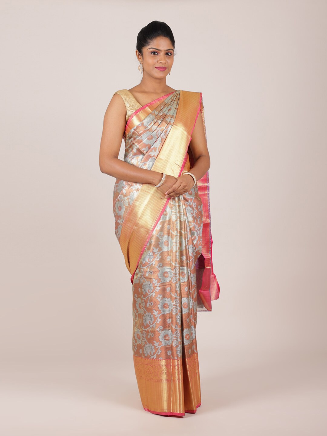 

Pothys Tan & Pink Floral Zari Saree