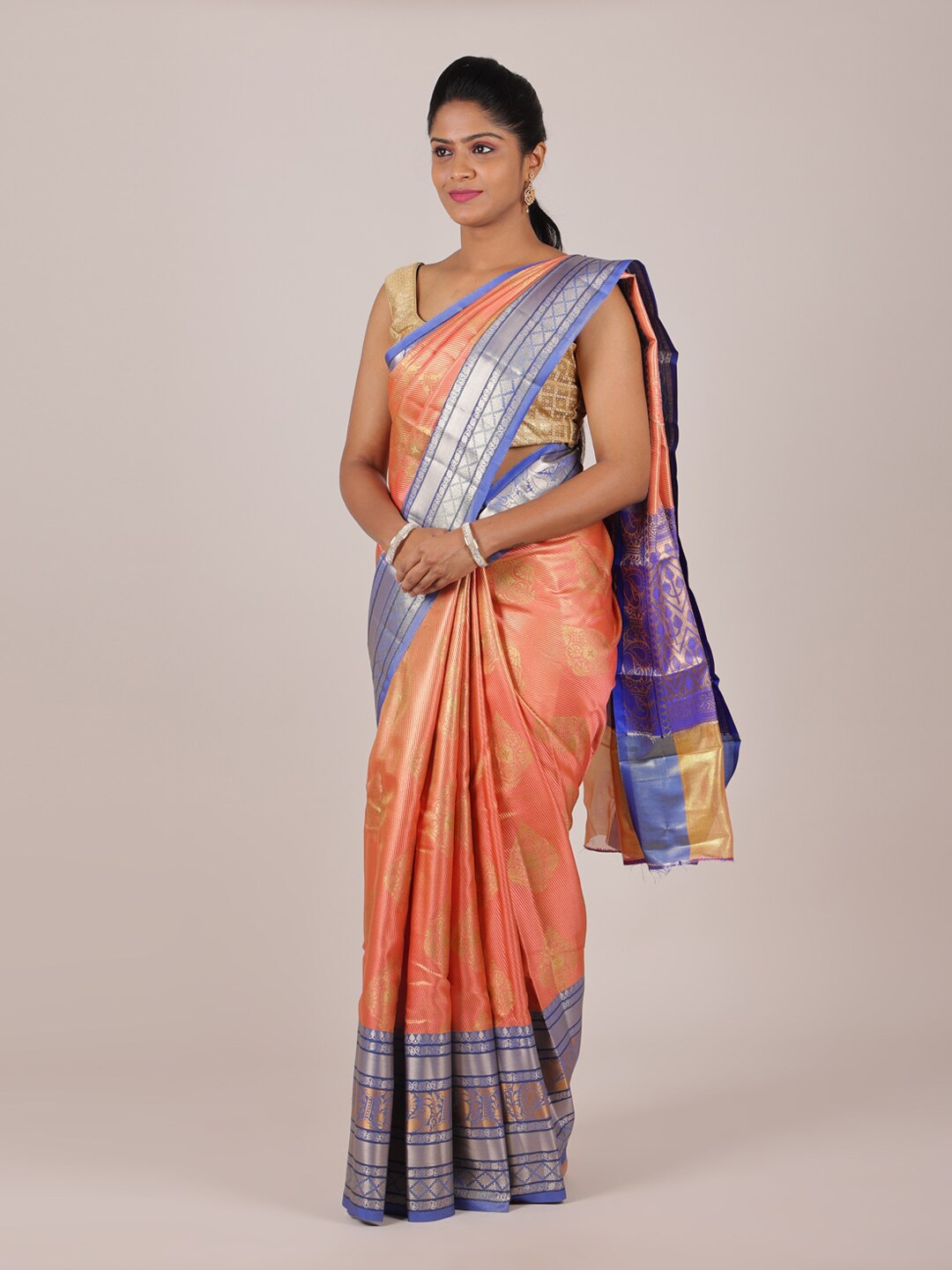 

Pothys Peach-Coloured & Blue Woven Design Zari Saree