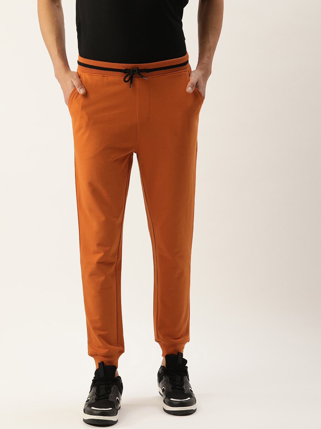 

FOREVER 21 Men Rust Orange Solid Mid-Rise Joggers Trousers