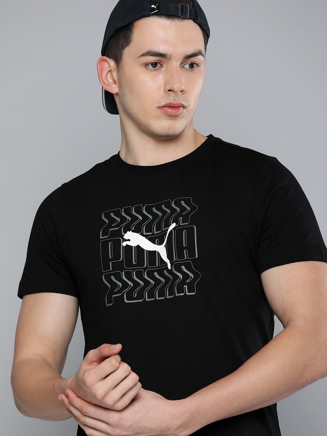 

Puma Men Black Graphic Brand Logo Print Round Neck Regular Sleeves Slim Fit T-shirt