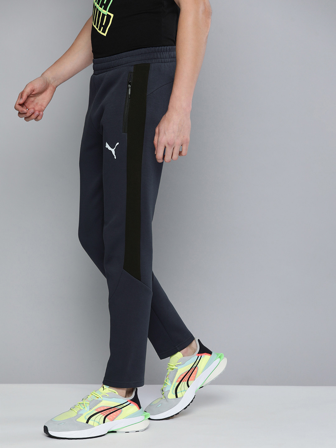 

Puma Men Blue& Black Colourblocked Evostripe Elasticated Dry Cell Tapered Sustainable Track Pants
