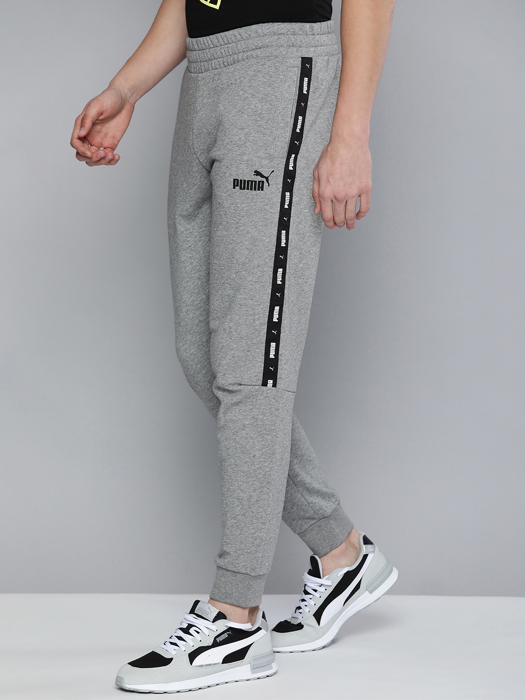 

Puma Typography Printed Mid Rise Regular Fit Joggers Sustainable Track Pants, Grey