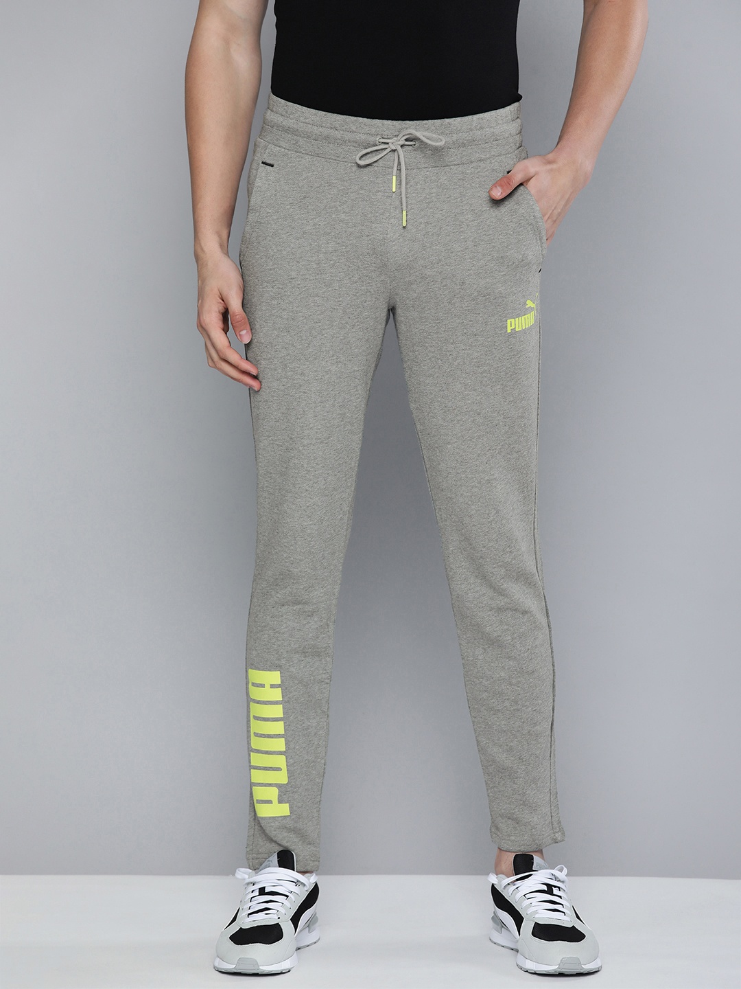 

Puma Men Grey Slim Tapered Fit Printed Mid Rise Elasticated Dry Cell Track Pants