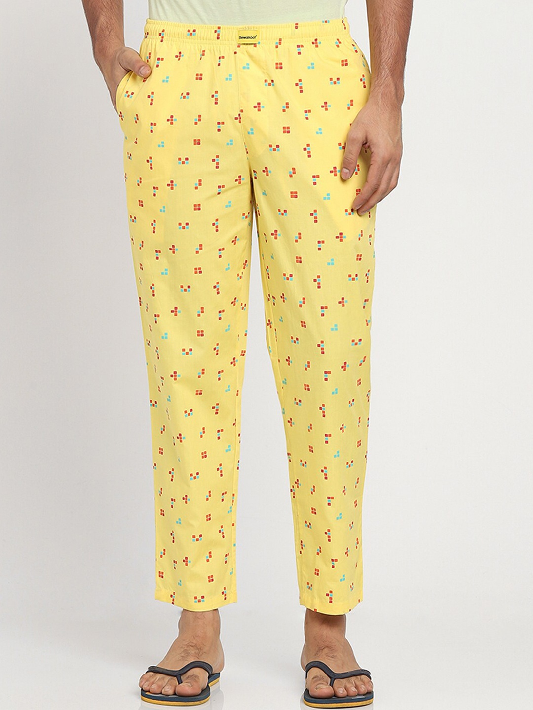 

Bewakoof Men Yellow & Red Printed Mid Rise Cotton Lounge Pants