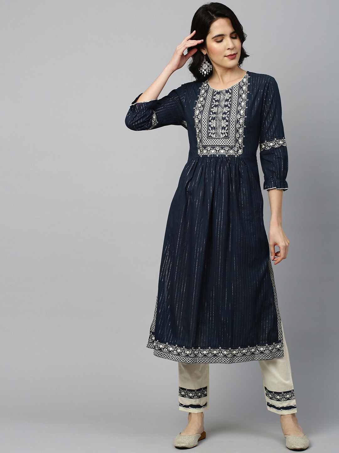 

FASHOR Women Teal Ethnic Motifs Embroidered Kurta with Trousers