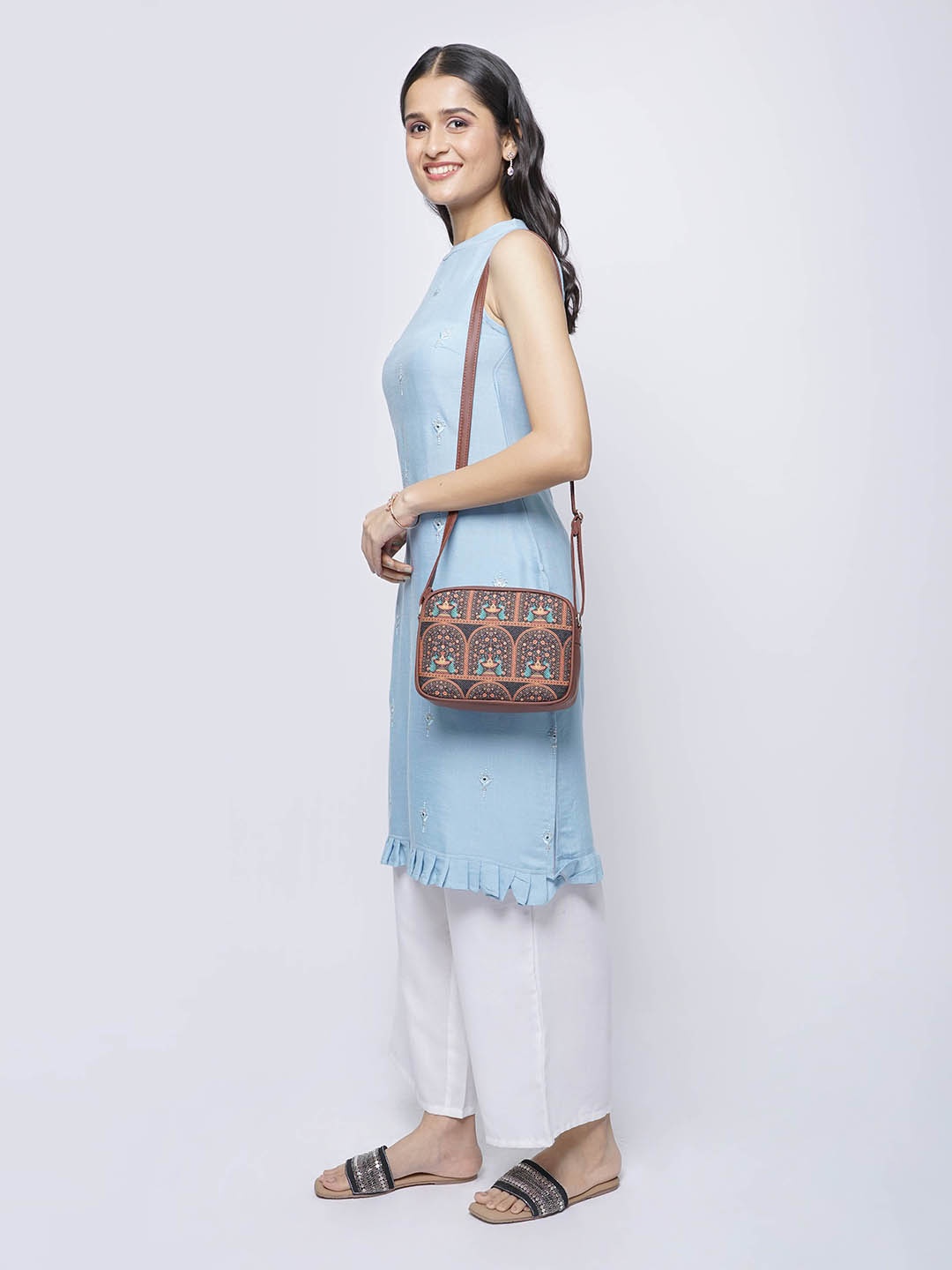 

ZOUK Brown Peacock Structured Sling Bag