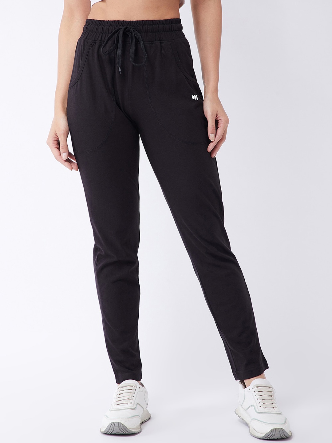 

Modeve Women Black Solid Regular Fit Track Pants