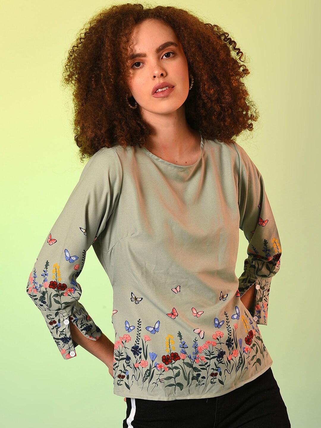 

Campus Sutra Green Floral Printed Regular Top