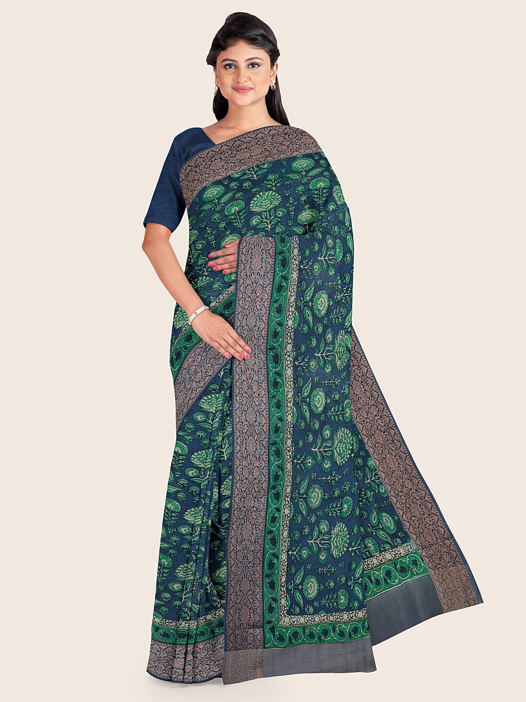 

Pothys Green & Navy Blue Ethnic Motifs Saree
