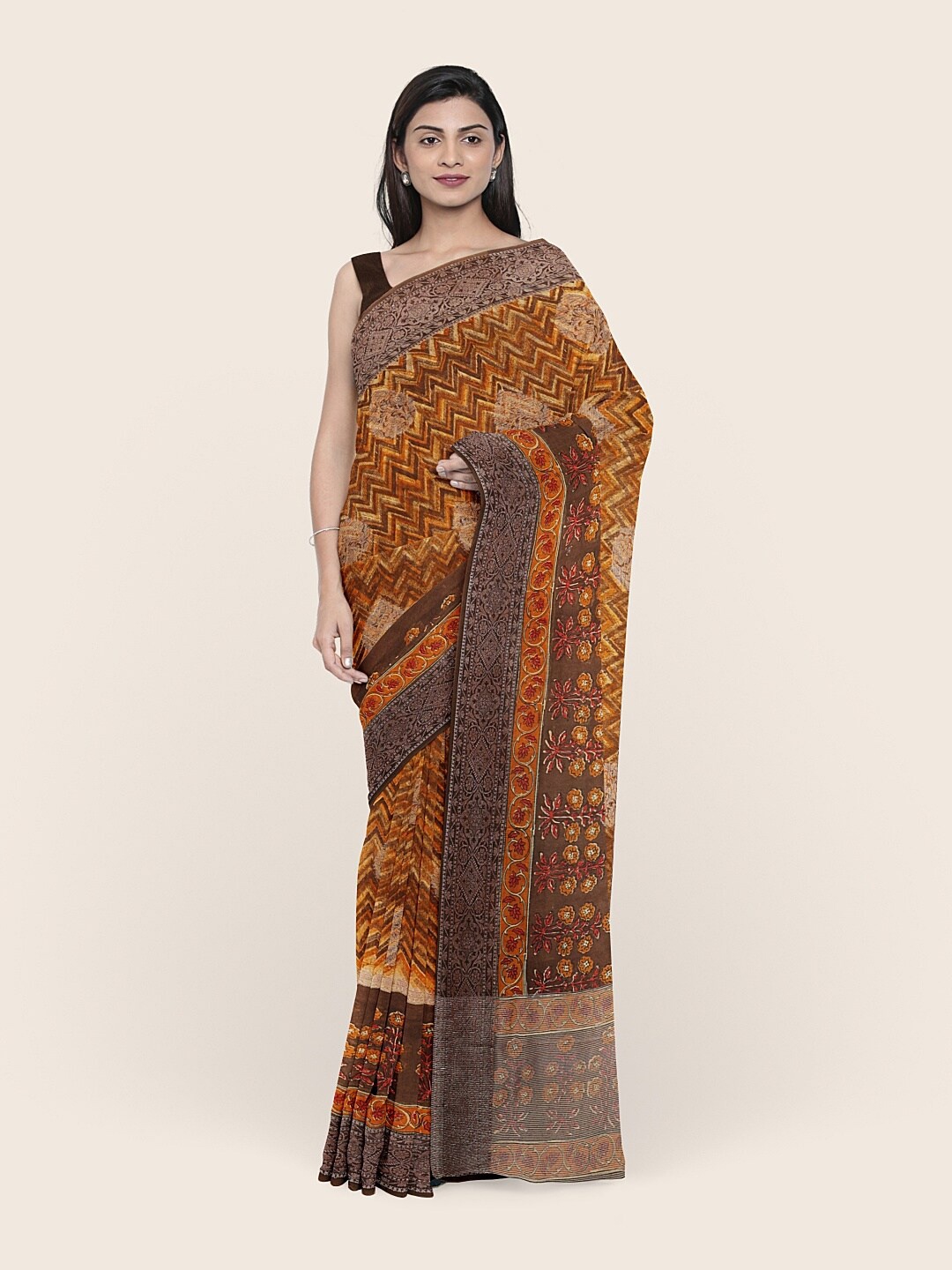 

Pothys Mustard & Brown Ethnic Motifs Saree