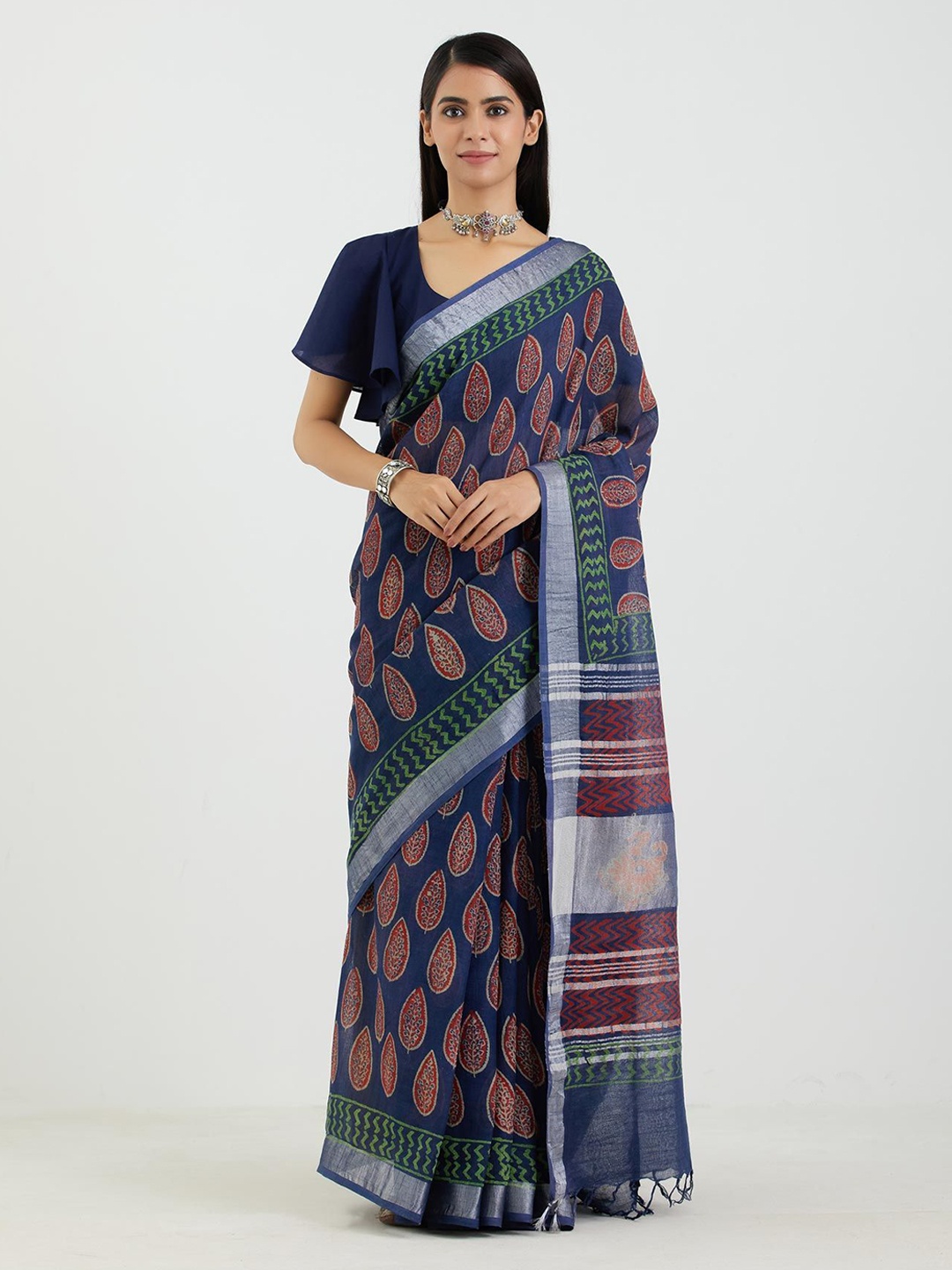 

Aujjessa Blue & Red Floral Zari Linen Blend Block Print Saree