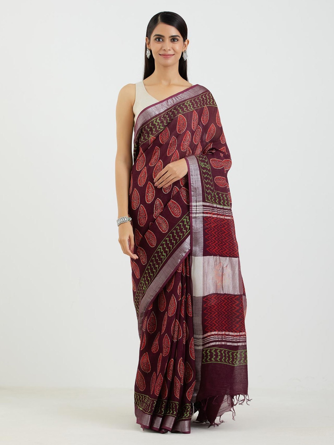

Aujjessa Burgundy & Maroon Ethnic Motifs Zari Linen Blend Block Print Saree