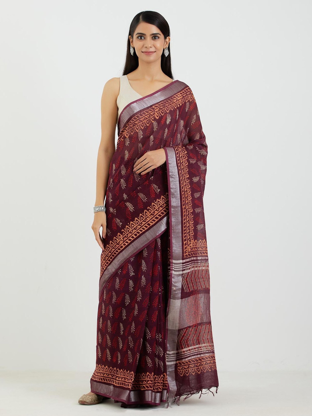 

Aujjessa Purple & Orange Ethnic Motifs Zari Linen Blend Bagru Saree