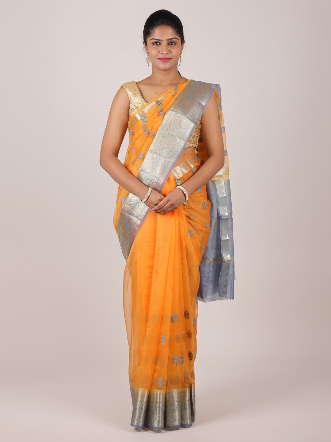 

Pothys Orange & Silver-Toned Floral Zari Organza Saree