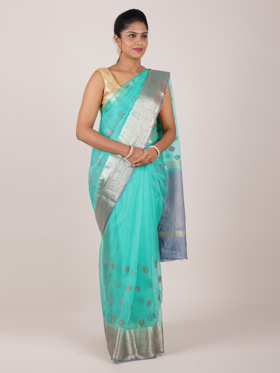 

Pothys Blue & Silver-Toned Ethnic Motifs Zari Organza Saree