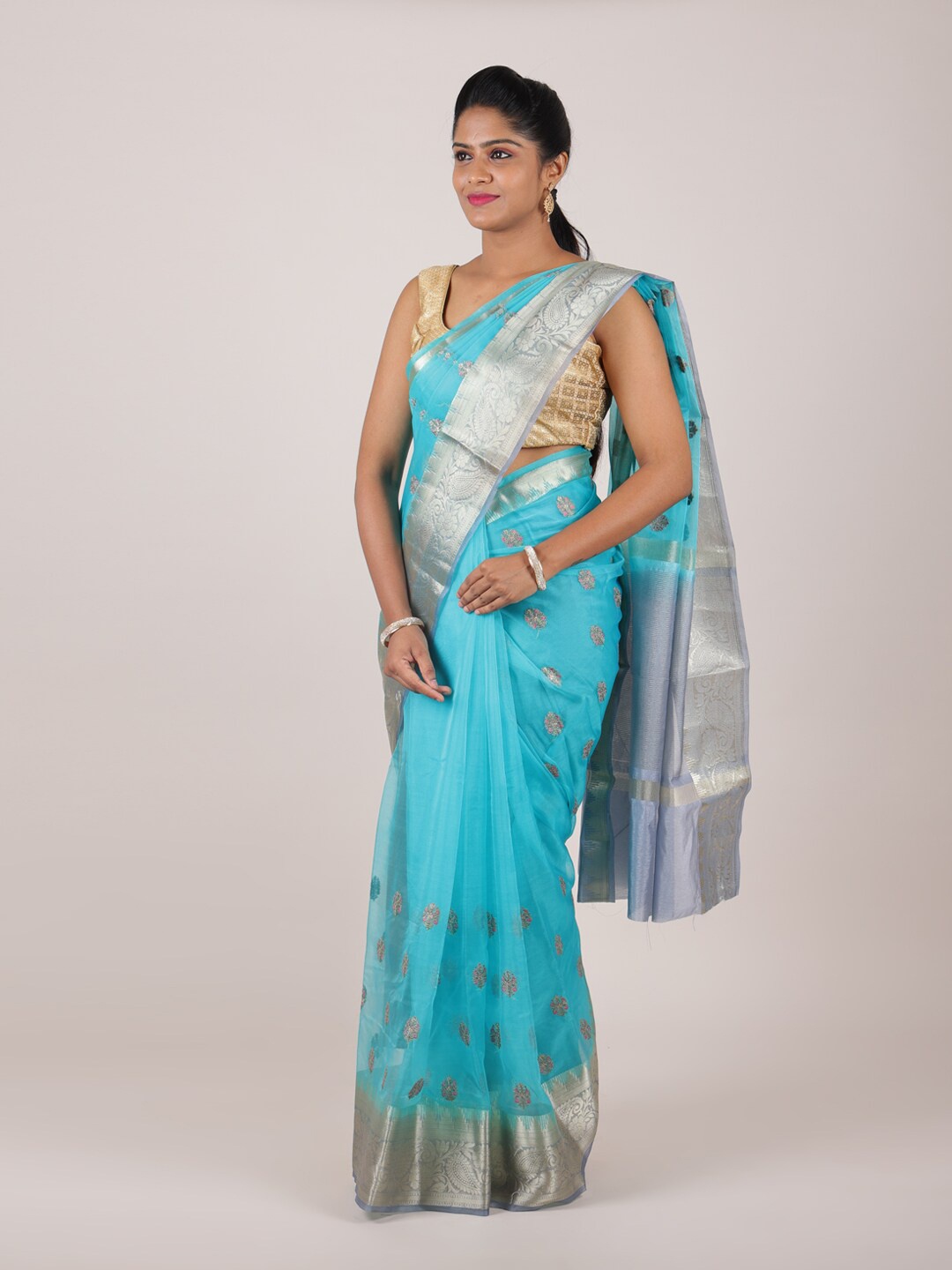 

Pothys Blue & Silver-Toned Floral Zari Organza Saree