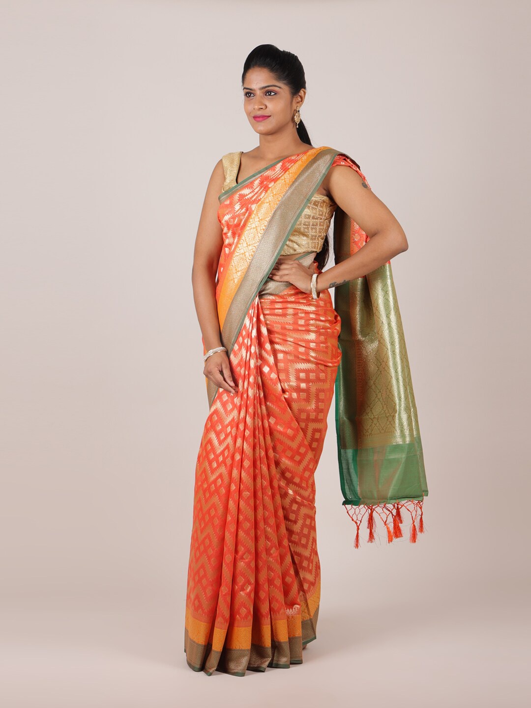 

Pothys Orange & Green Woven Design Zari Saree