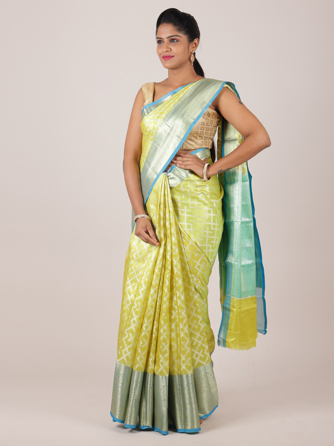 

Pothys Yellow & Green Ethnic Motifs Zari Saree