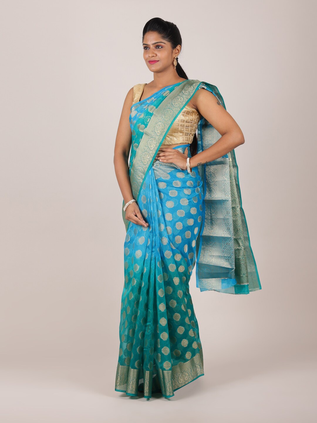 

Pothys Sea Green & Gold-Toned Ethnic Motifs Zari Organza Silk Saree