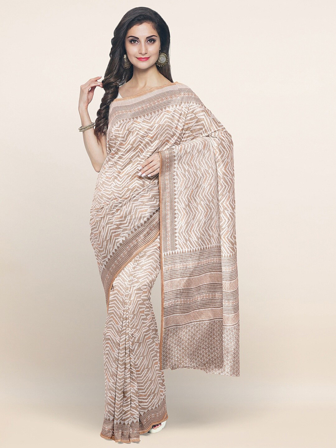 

Pothys Off White & Tan Printed Saree