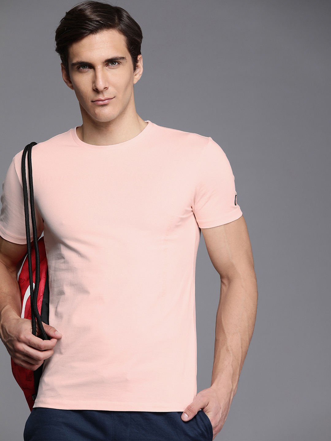 

Allen Solly Tribe Men Coral Pink Typography Printed T-shirt